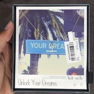 Kit-sch necklace and earring duo